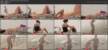 Rudefly.com the naked body of beach nudist girl stretched on the sand.mp4.jpg